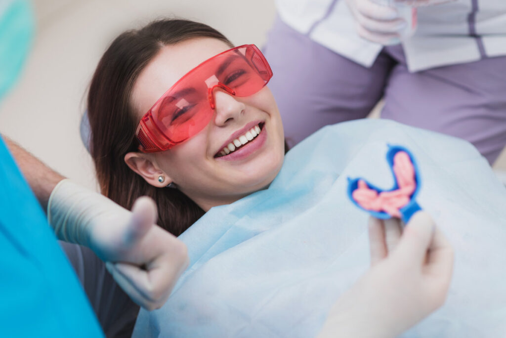 doctor performs the procedure for cleaning teeth